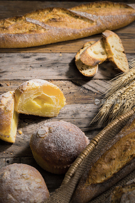 Freshly baked bread on wooden table